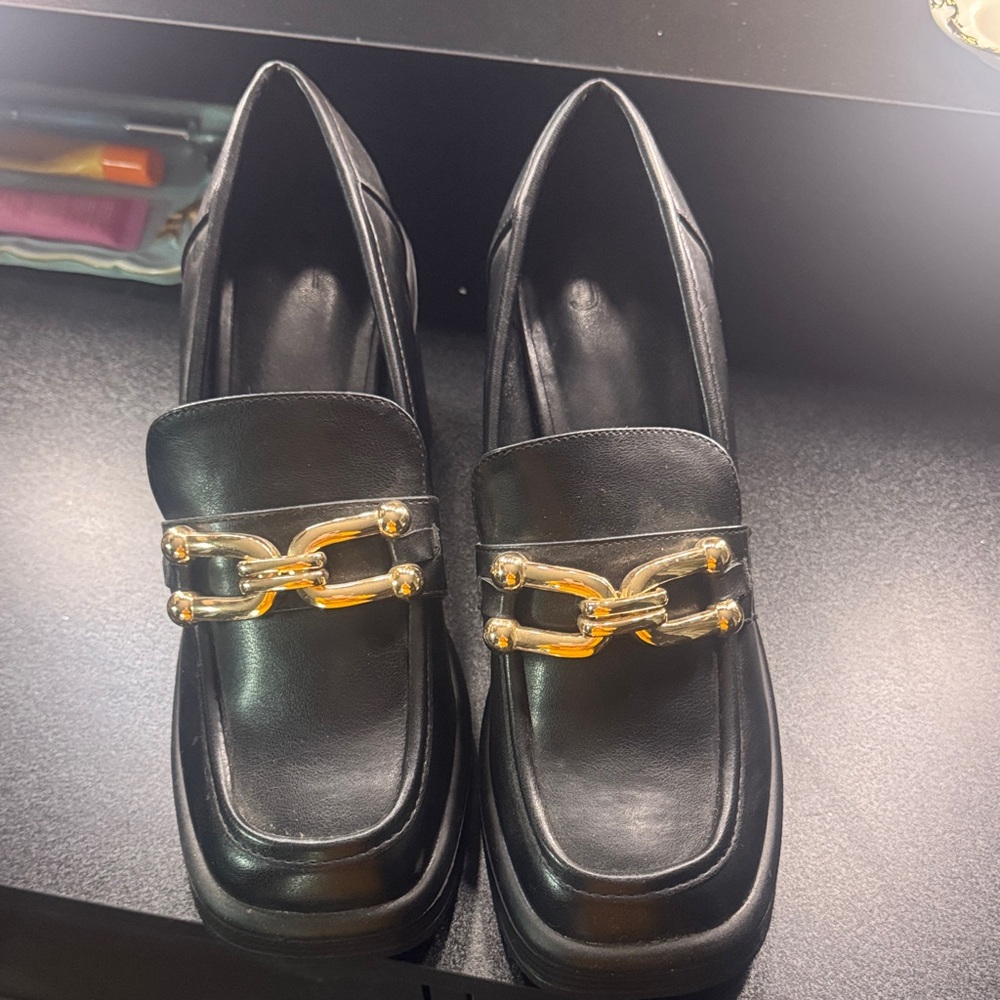 Elegant Black Loafers with Gold Accent
